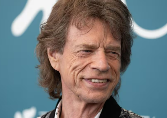 Sir Mick Jagger is “completely shocked and devastated”