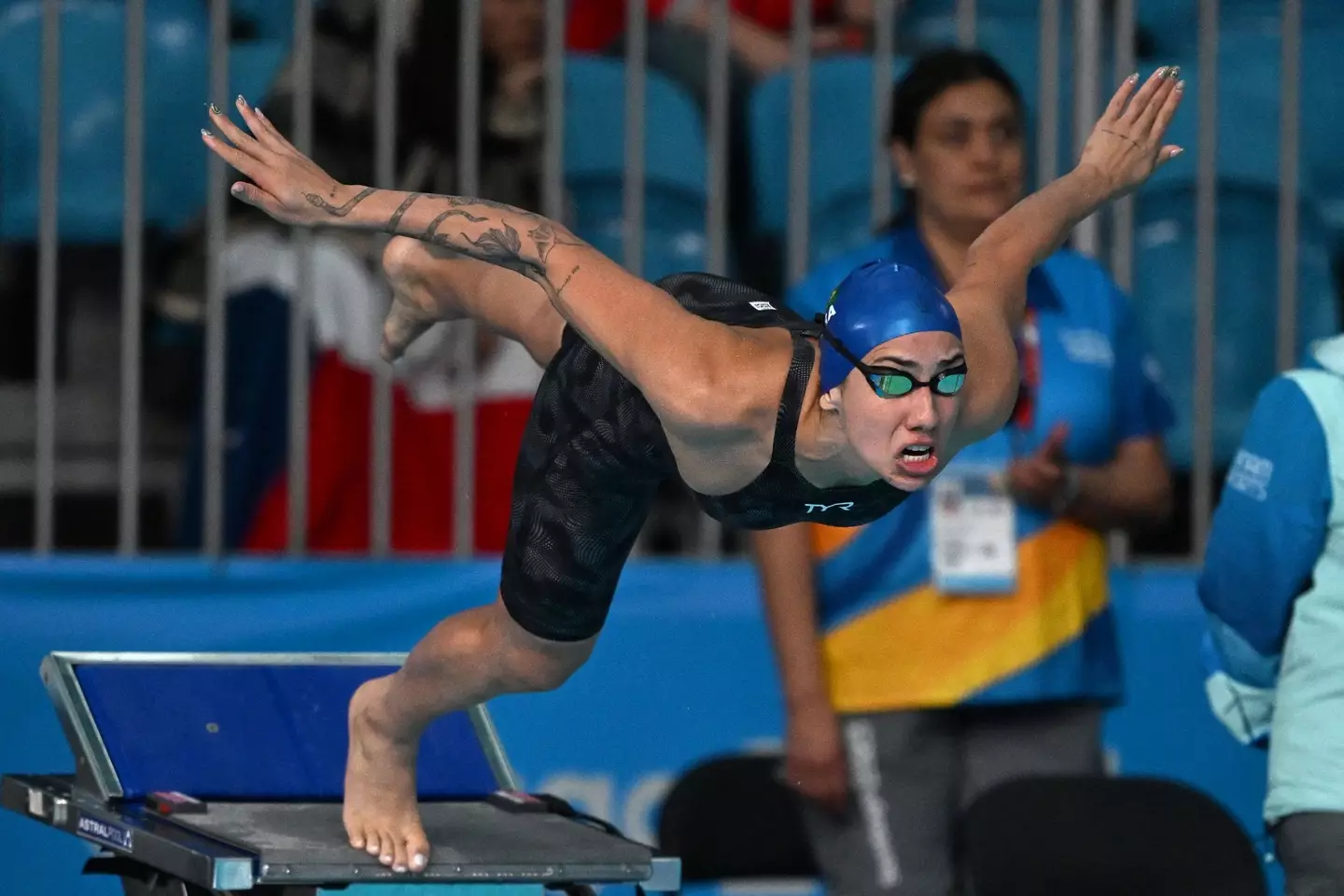 The swimmer has been sent home. (MAURO PIMENTEL/AFP via Getty Images)