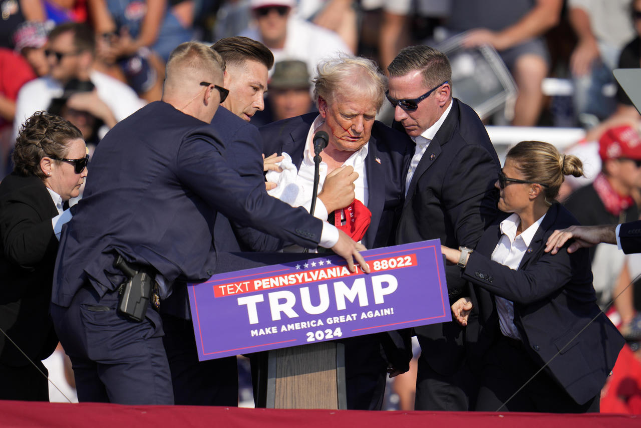 Trump says a bullet hit his ear during the rally incident, but he is safe; the gunman and an audience member are dead - Short Quotes